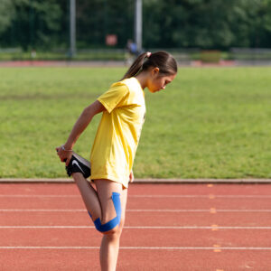 A Knightsbridge School pupil, a private school in London, warming up for a PE lesson